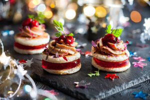 Festive foie gras appetizer with cranberry chutney and jelly