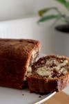 Close-up of a sliced homemade marble cake on a plate, perfect for breakfast or dessert.