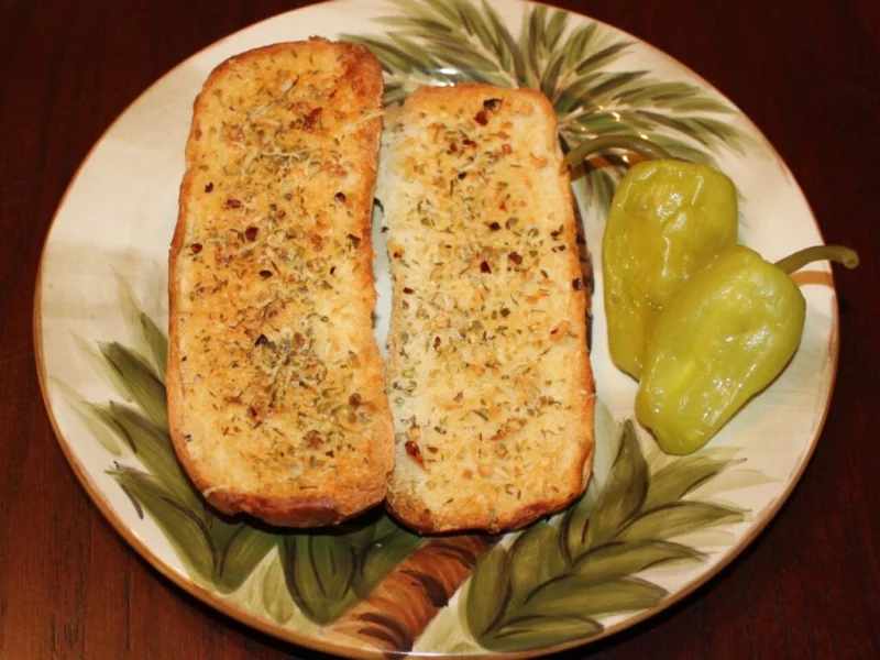 Garlic butter toast with herbs on a plate