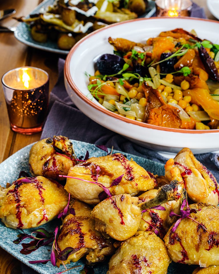 Delicious gourmet meal featuring roasted chicken and vegetables, perfect for a cozy dinner in London.