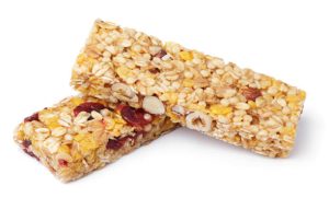 Granola bars with oats, nuts, and dried fruit on a white background