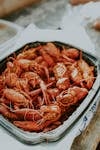 Mouth-watering cooked crawfish platter perfect for seafood lovers. Ideal for culinary presentations.